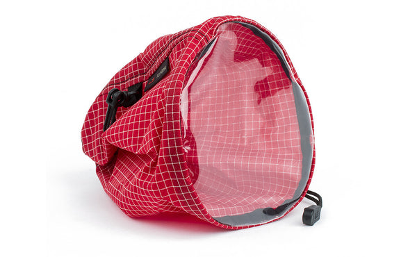 A medium, clear-bottom Yarn Stuff Sack in Iberian (red with white grid) 200 Halcyon.